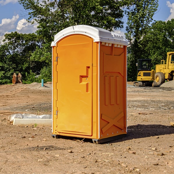 what is the cost difference between standard and deluxe portable restroom rentals in Upland